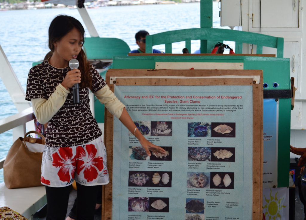 Community educator giving a lecture on giant clam conservation in the Philippines