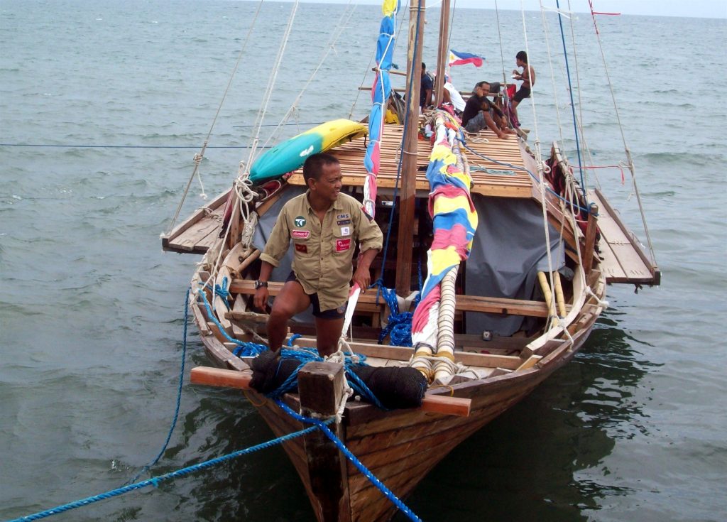 Dr. Teofredo T. Esguerra providing medical assistance during a rescue mission at sea
