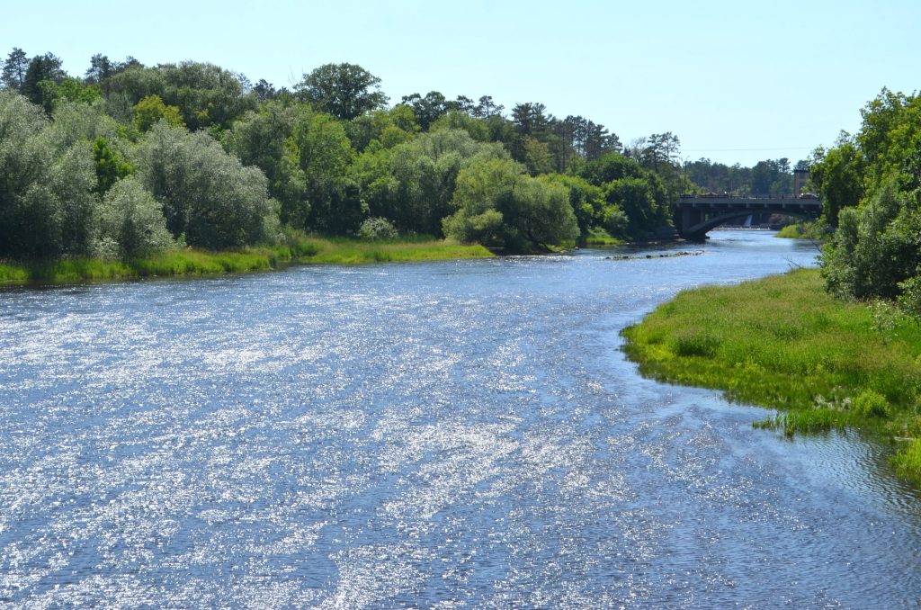 Flowing river landscape captured during Grand Rapids Minnesota travel adventure