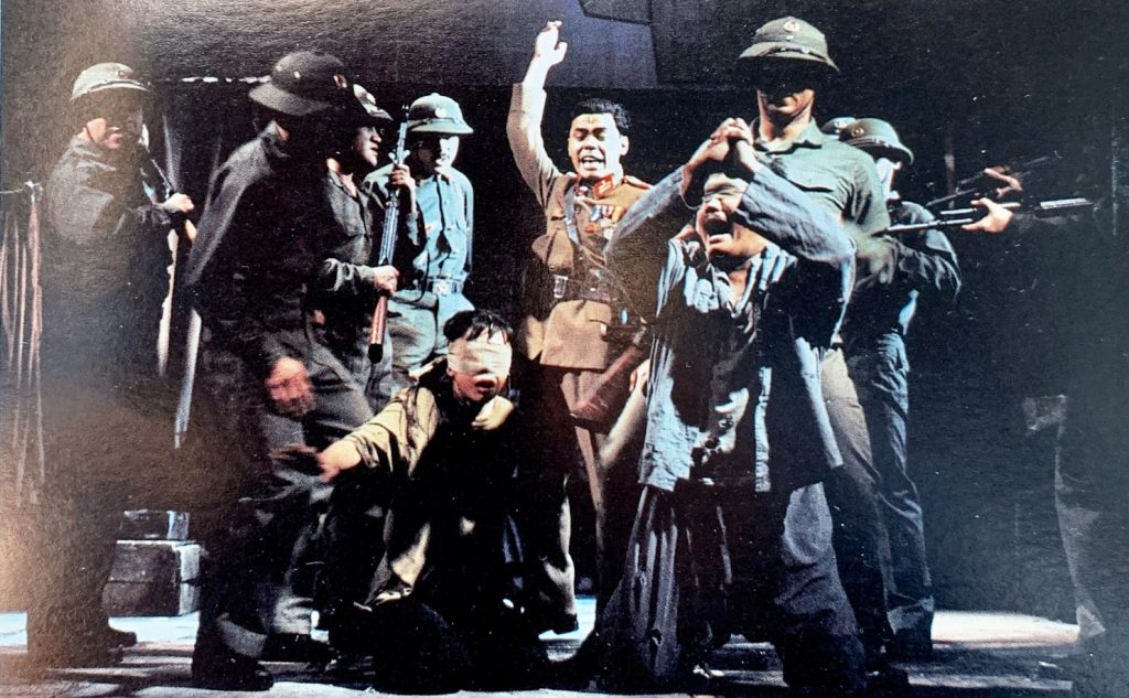 Jojo Dela Cerna performing as Thuy in the musical Miss Saigon