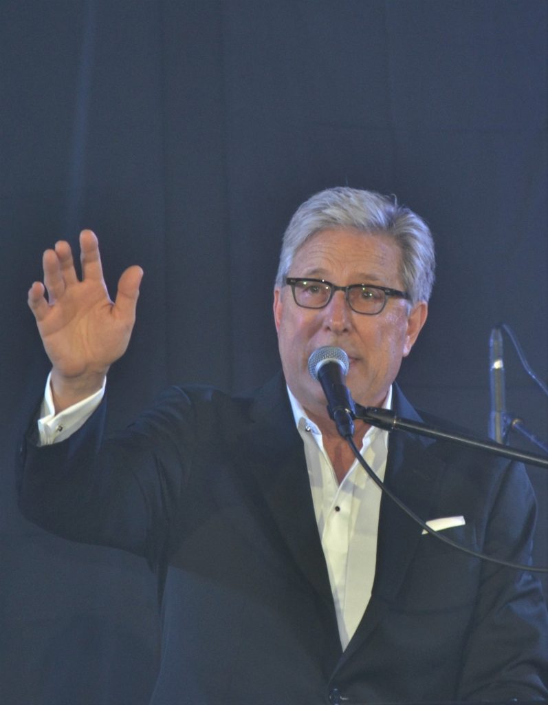 Don Moen music ministry as he leads worship and sings during a live event