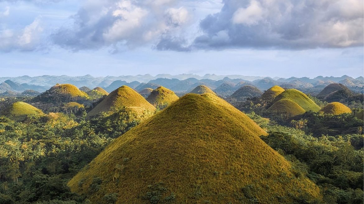 Scenic view of the Chocolate Hills in Bohol province, highlighting the importance of tourism and local health policy planning.