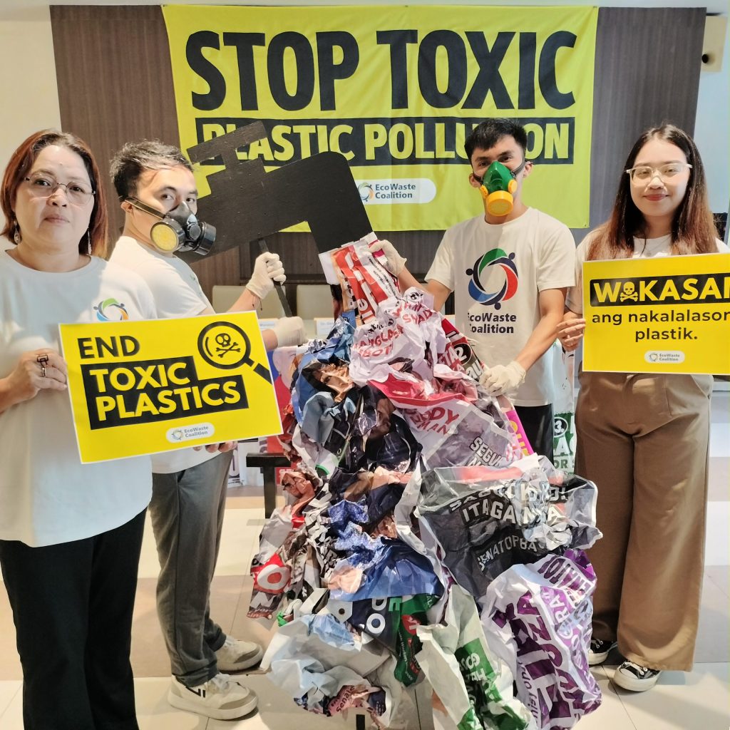 EcoWaste Coalition members show toxic plastic tarpaulins found with high cadmium levels
