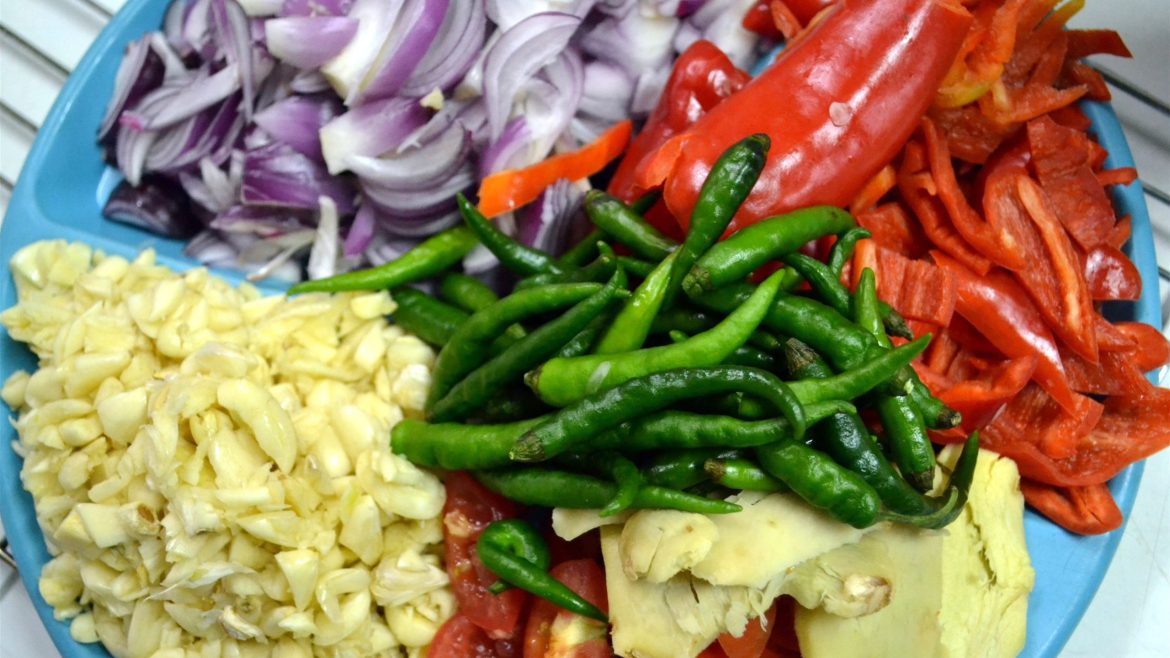 Chopped sweet pepper, garlic, onions, and chili prepared for cooking