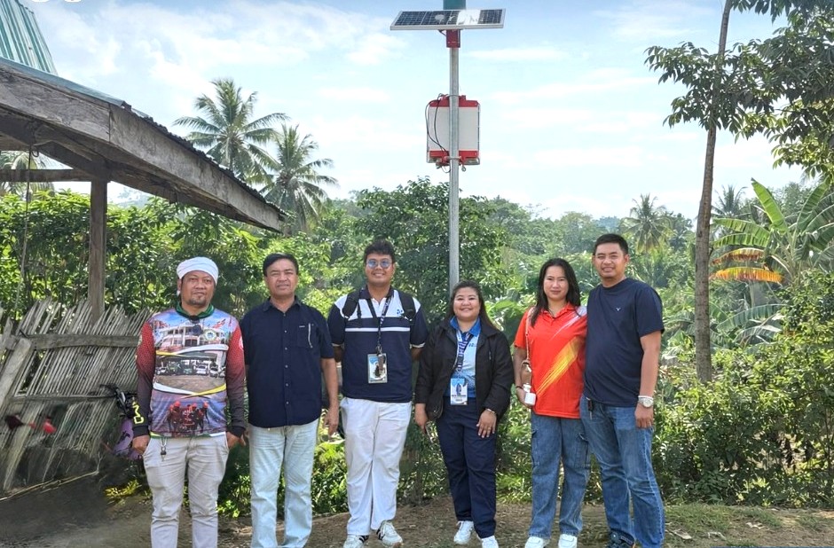 DOST Davao Region and LGU Sulop officials during deployment of automated rain gauge for disaster resilience in Davao del Sur