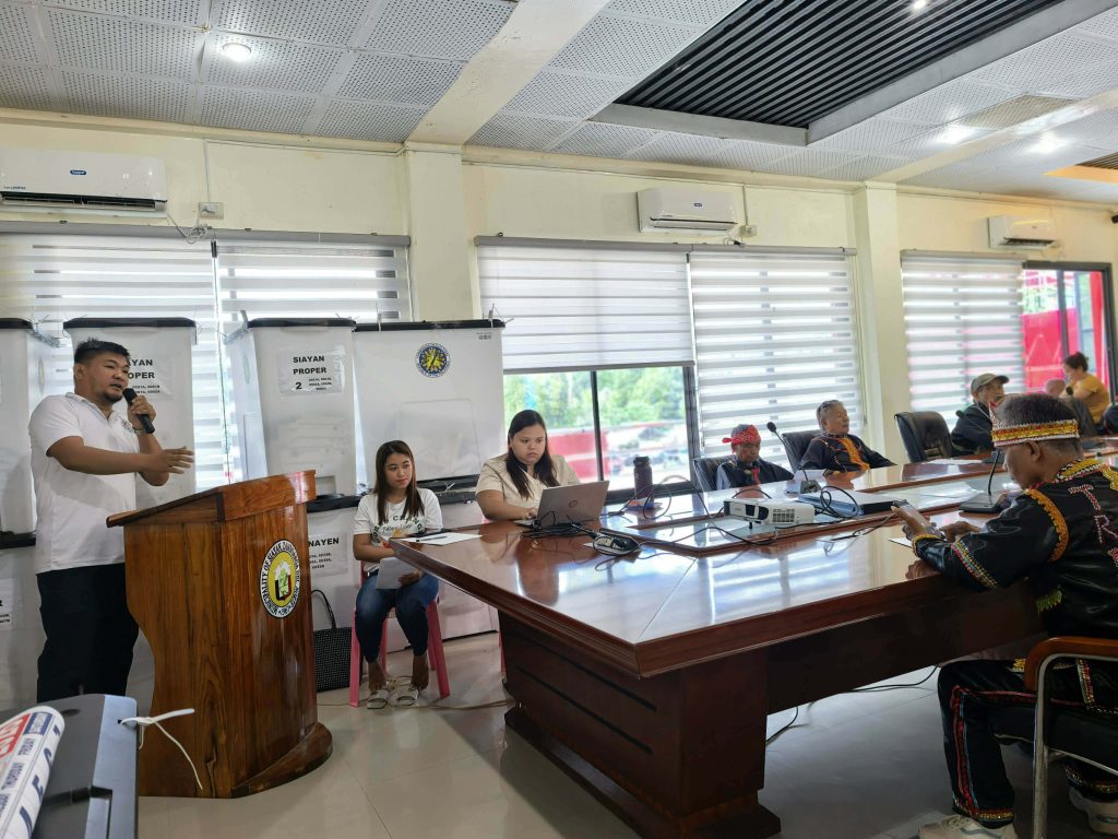 Mr. Rey Anugon presenting the Zero Poverty PH 2030 program to local officials in Siayan