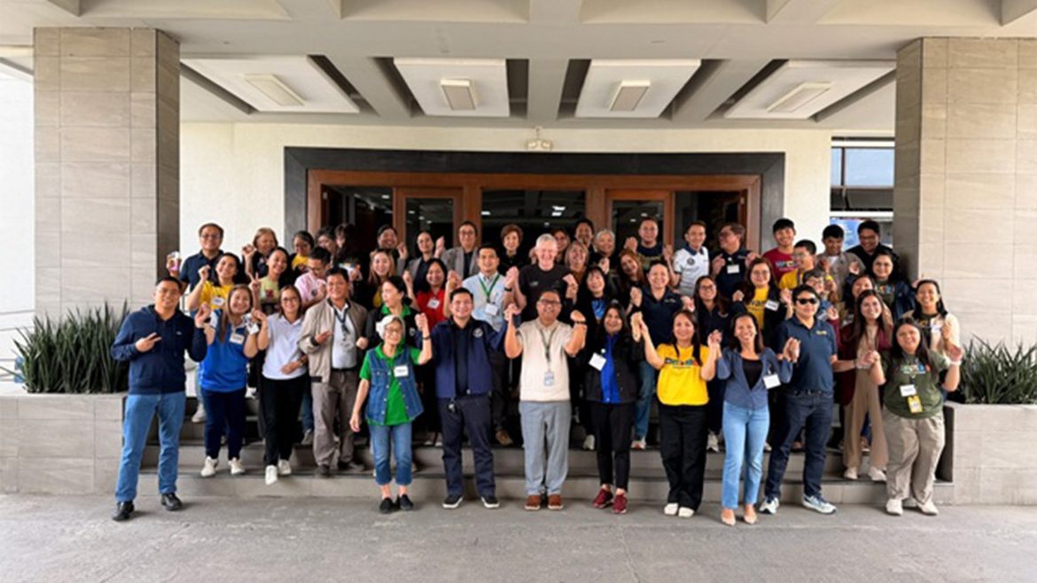 Leaders and partners gather for the launch of the high-zinc rice program benefiting children in seven provinces.