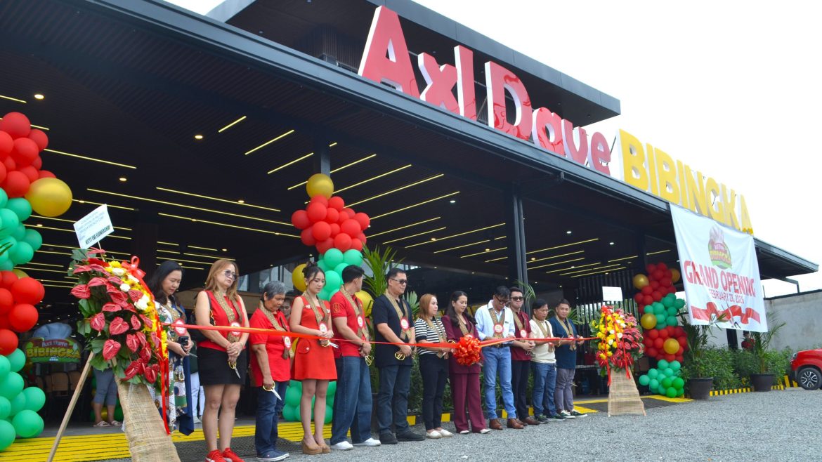 Shelves filled with local delicacies inside Axl Dave Bibingka Davao de Oro pasalubong center.