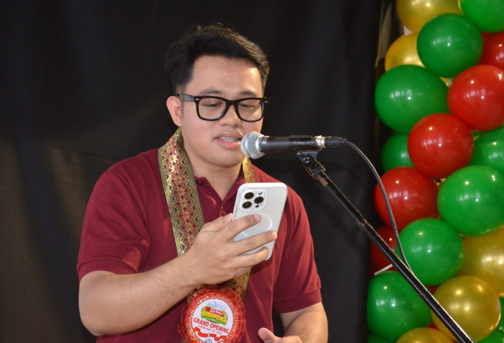 Officials and owners lead the ribbon-cutting ceremony at Axl Dave Bibingka Davao de Oro in Nabunturan.