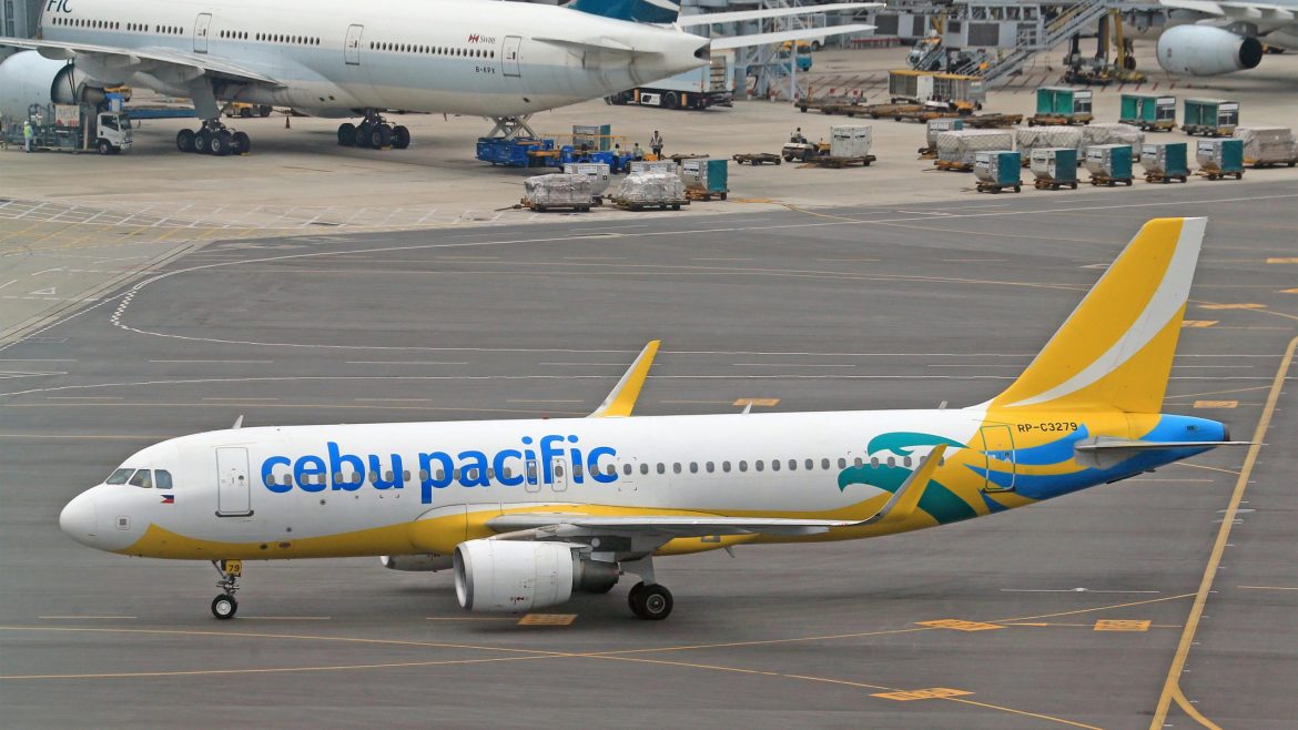 Cebu Pacific aircraft on runway as flight suspensions affect routes due to rising fuel costs