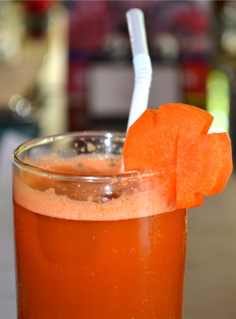 Glass of fresh carrot juice rich in vitamin A and antioxidants