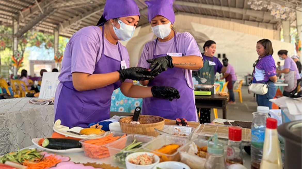 Rice Granary cities nutrition program participants preparing healthy meals during a community food and nutrition activity in Nueva Ecija
