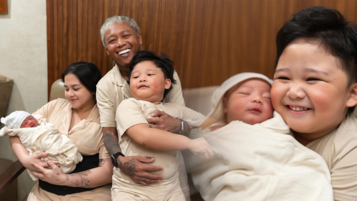 Whamos Cruz and Antonette Gail holding newborn Baby Sky with their family in first photo reveal