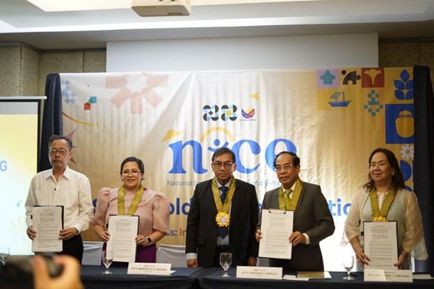Award recipients pose during the DOST invention contest recognition ceremony