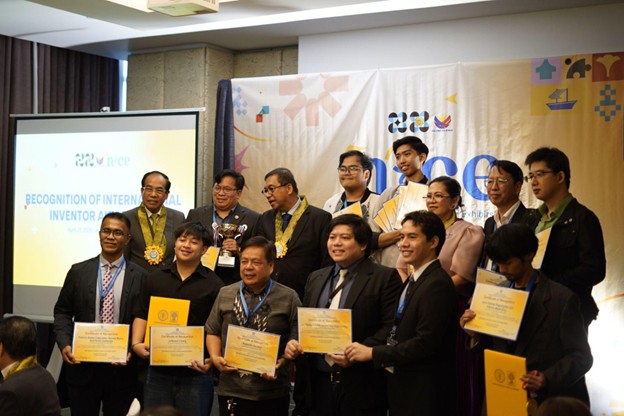 Filipino inventors and organizers pose for a group photo during NICE 2026