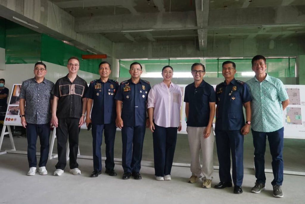 Alan Peter Cayetano and project officials pose during an inspection visit at the forensic laboratory construction site.